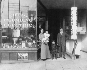 Asataro and Fusa Yamada with two children at their store in Seattle, 1915 (courtesy Byron Ishiwata)